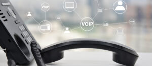 telephone off the hook showing VoIP, computers, and people 303 Networks
