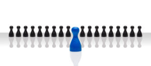 black chess like pieces with one blue piece in the middle 303 Networks